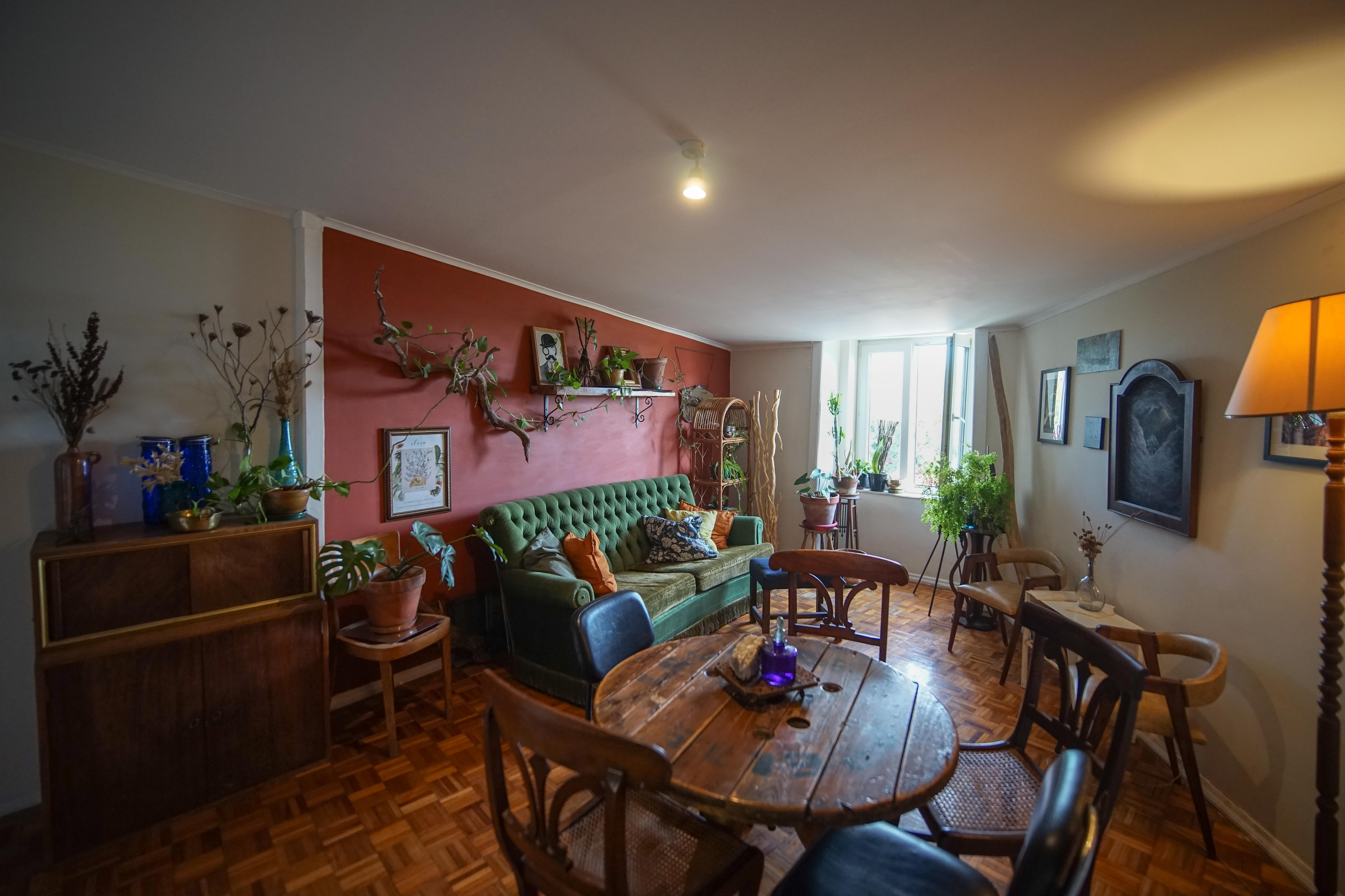 Elegant bedroom in Boho Chic Apartment with artistic decor and modern amenities