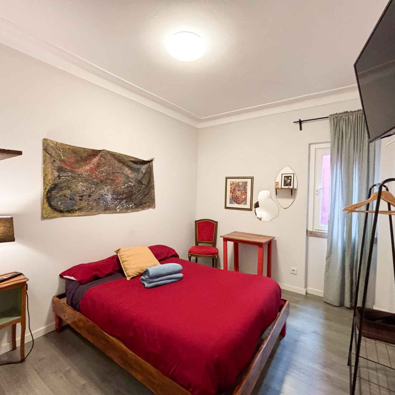 room with wooden furniture bed